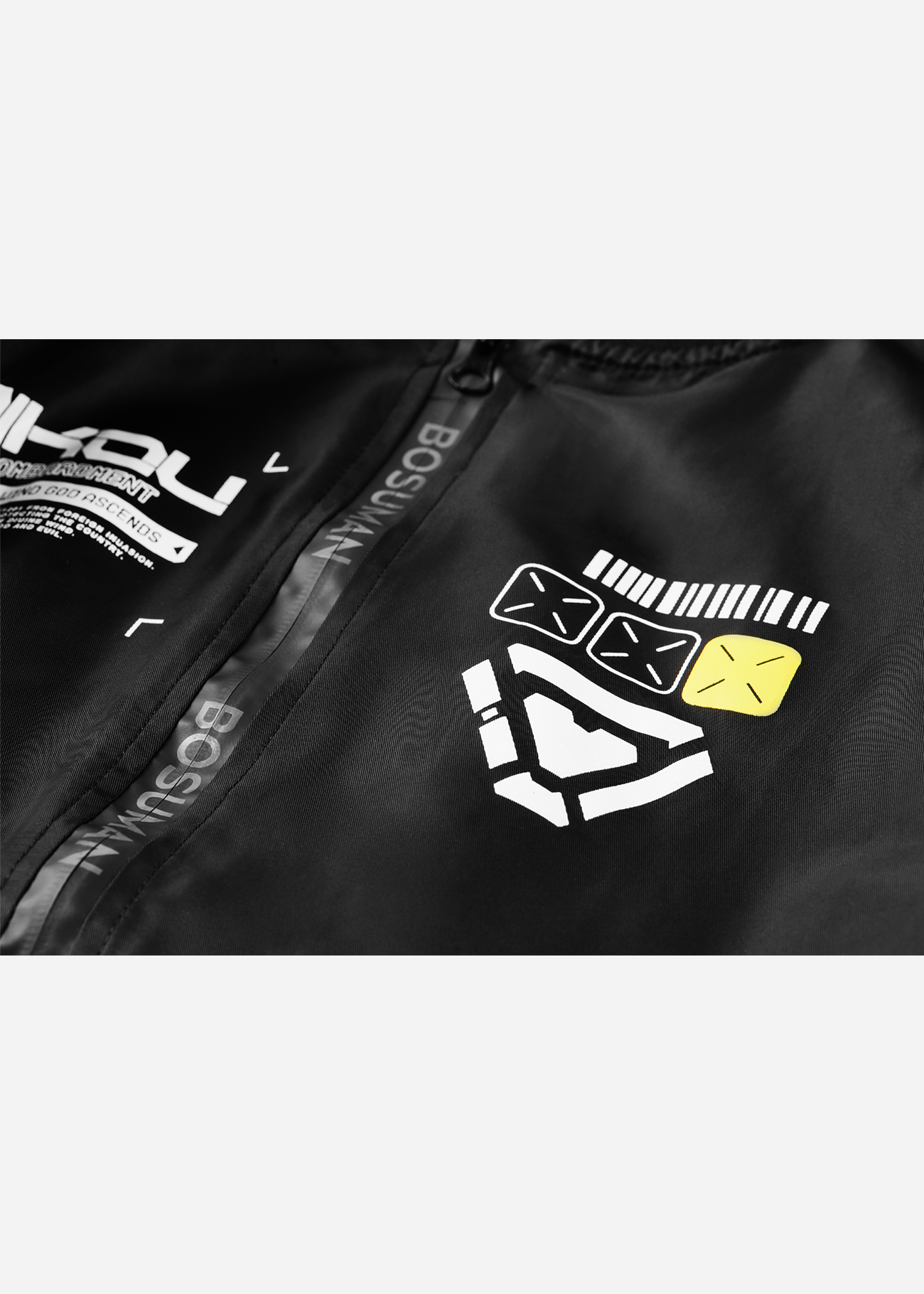 Close up photo of the front of a Black Bomber Jacket featuring Raijin, a Japanese Mythology Figure converted to an anime inspired bomber jacket