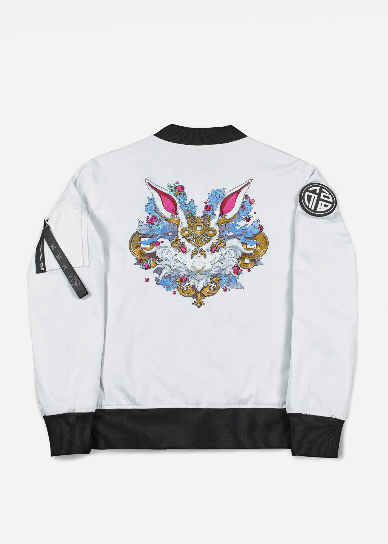 Photo of the back of Zodiac Bomber Jacket featuring Rabbit embroidery on a white piece of clothing